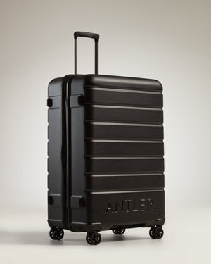 Antler Logo Check - In Large Suitcase - Black - The Bag House®™